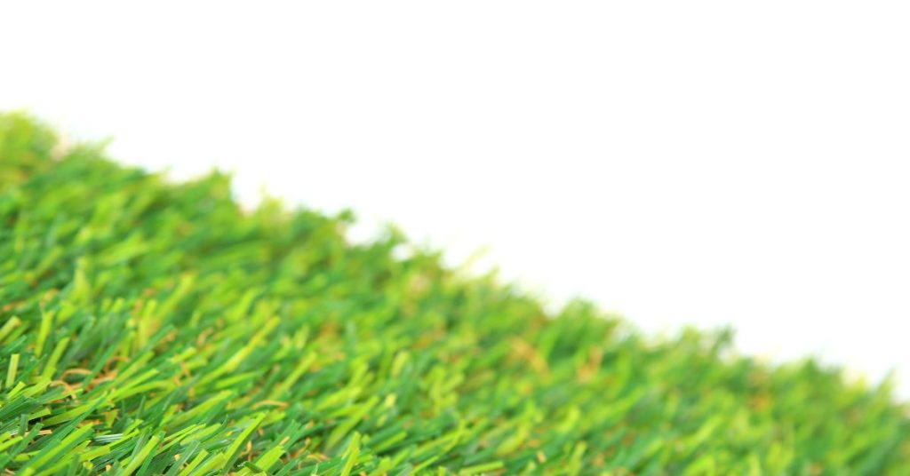 Backyard transformed with a long lasting artificial lawn